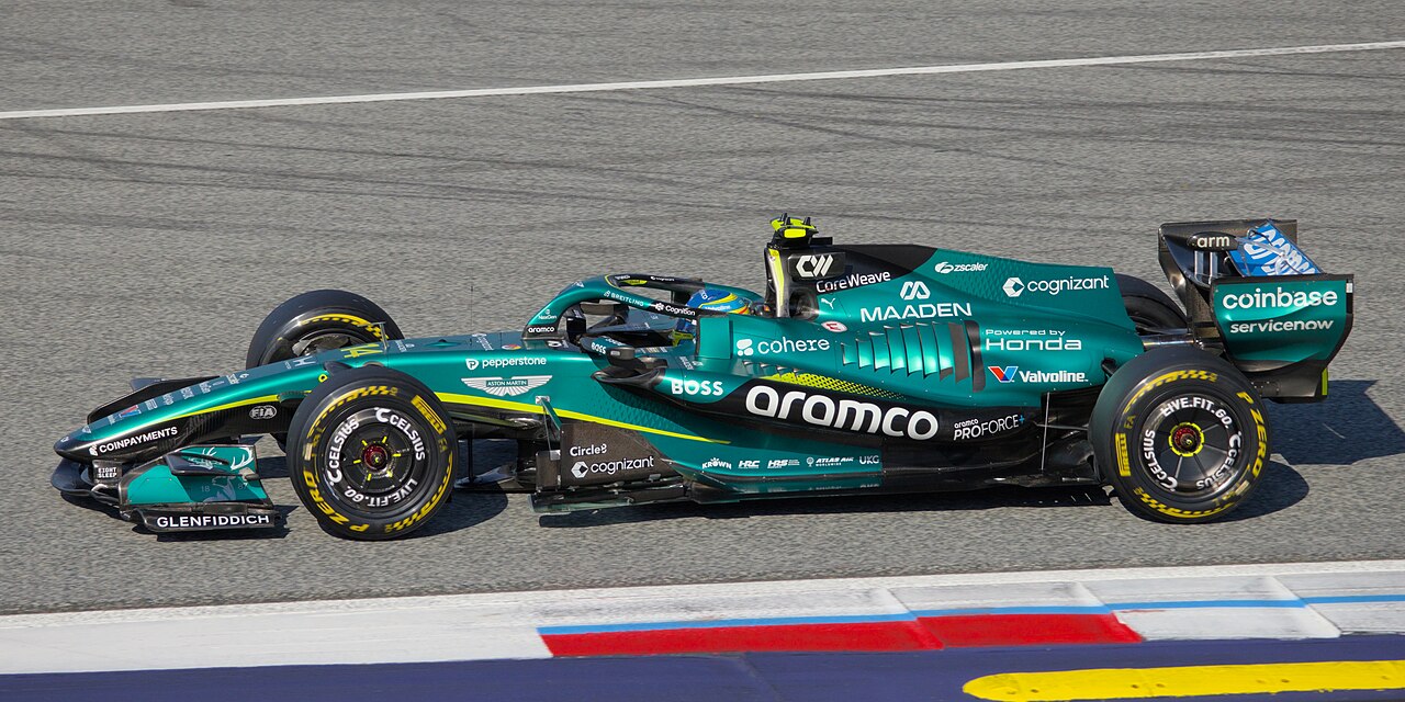 Aston Martin AMR26 Formula 1 car on track, Powered by Honda livery visible