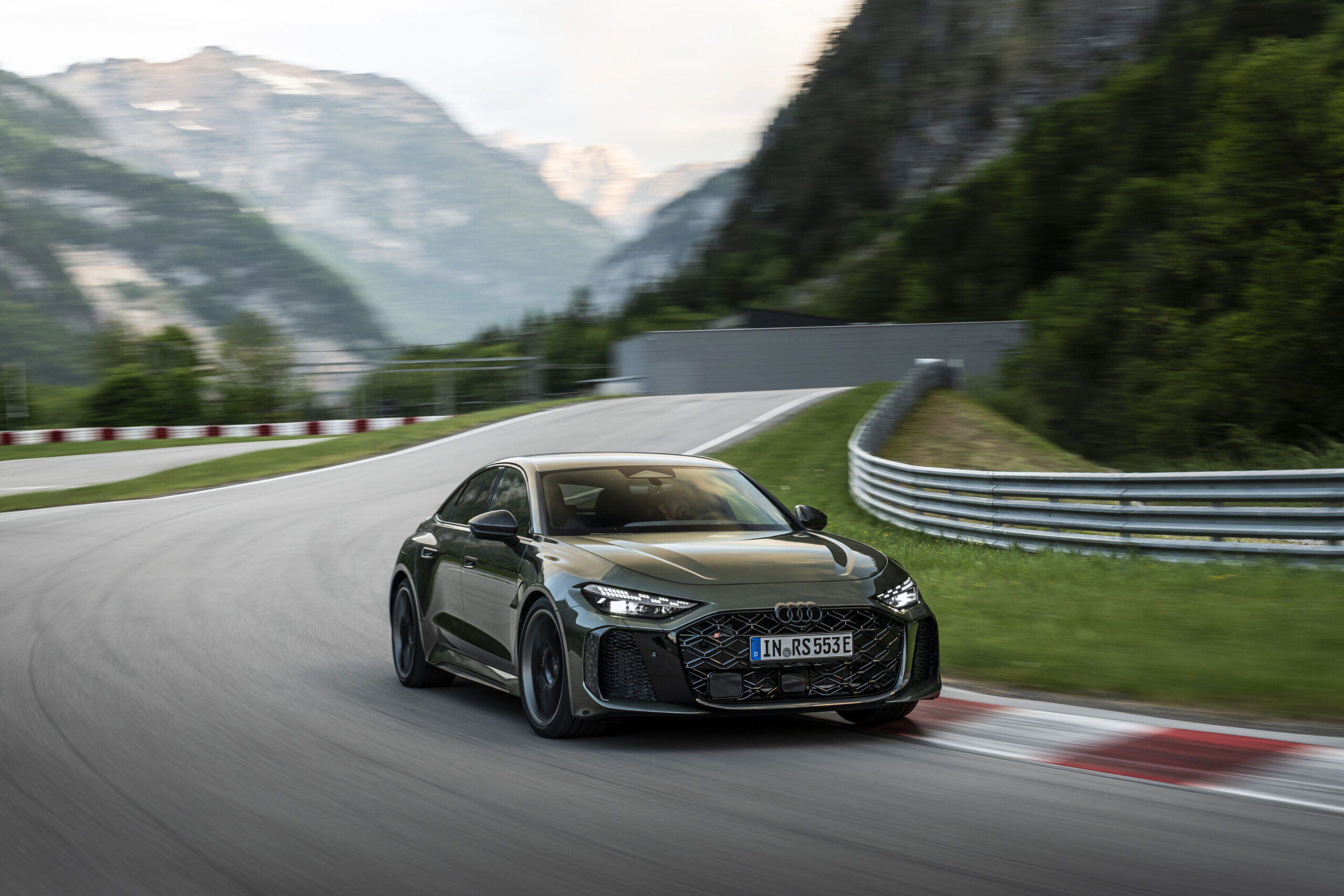 Audi RS5 2026 in Bedford Green cornering on a track