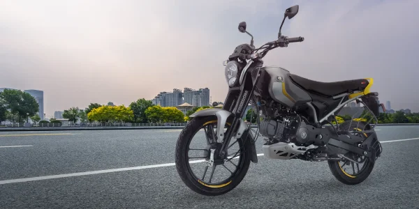 Bajaj Freedom 125 riding on an open road