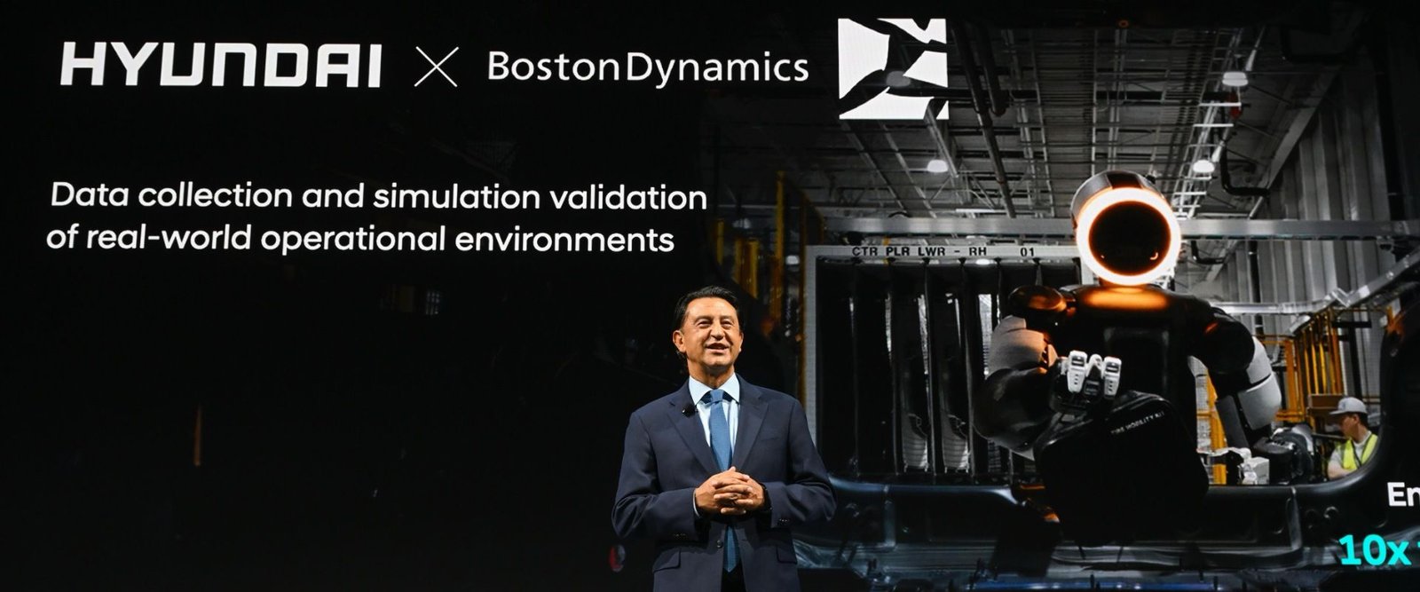 Hyundai executive presenting Boston Dynamics humanoid robot factory plans at Investor Day 2026
