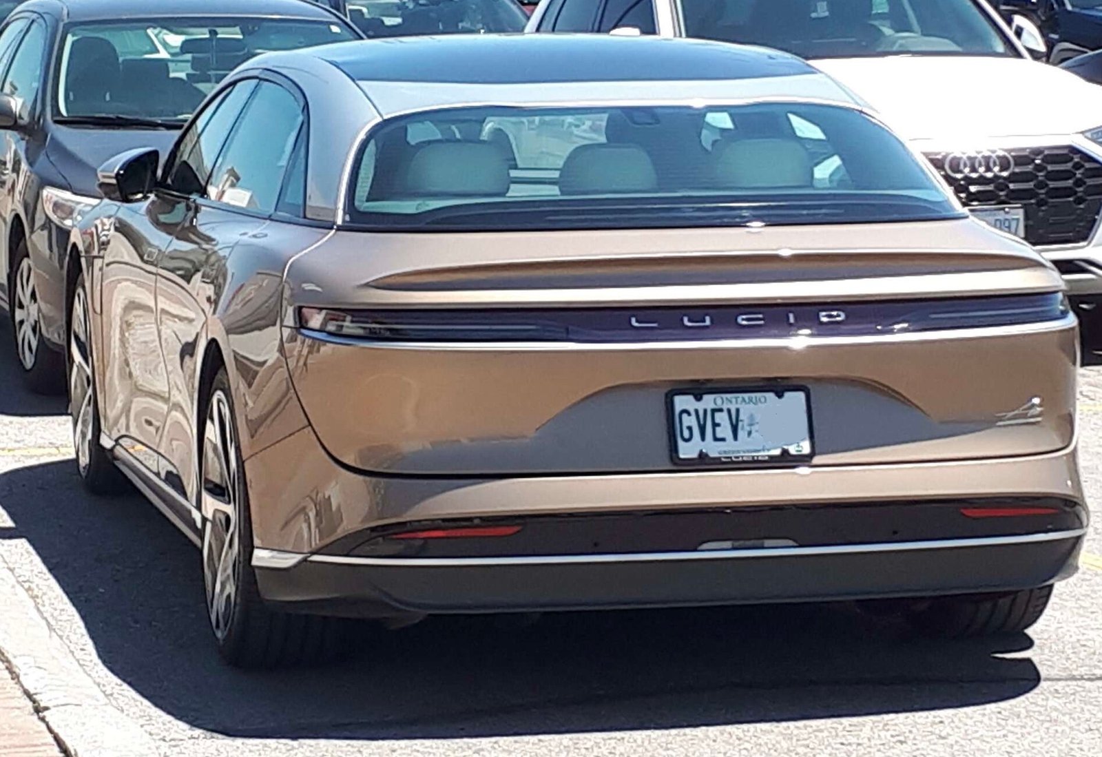 Lucid Air rear view showing tail lights and rear windscreen