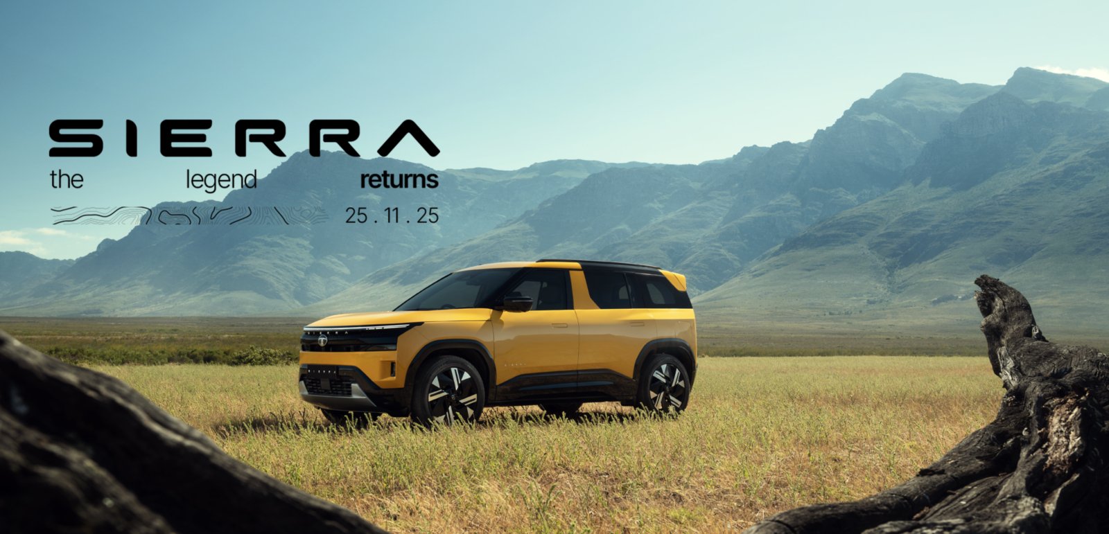 Tata Sierra 2026 driving on a highway with mountains in the background