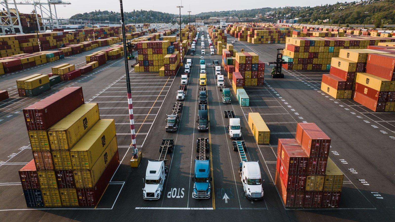 Shipping containers and trucks at a North American port