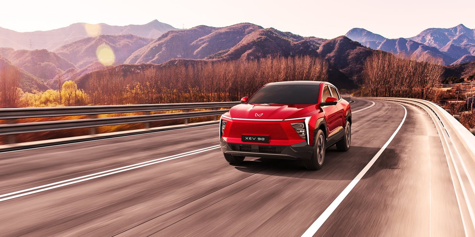 Mahindra XEV 9e driving on a highway