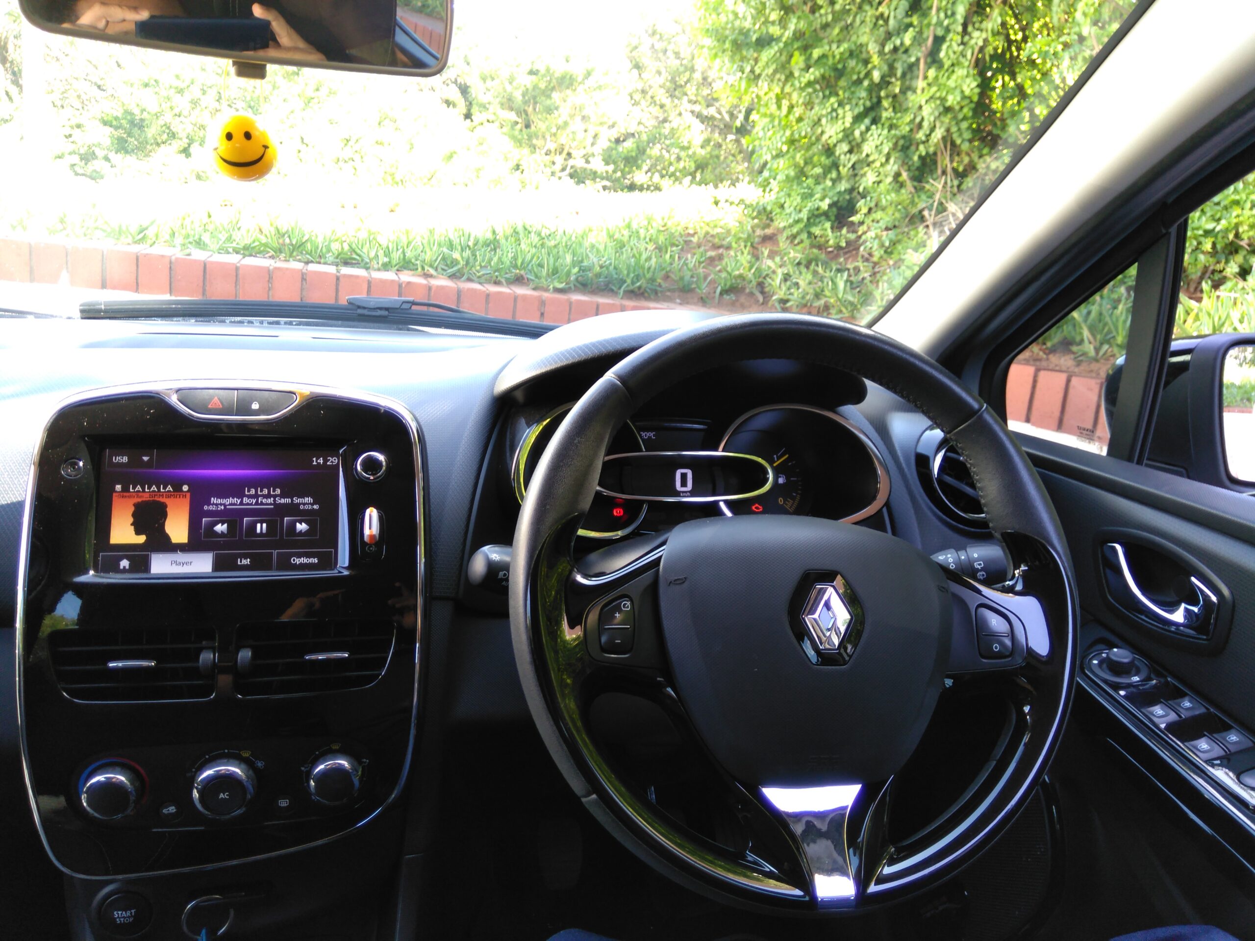 Car instrument cluster and dashboard showing fuel gauge and trip computer