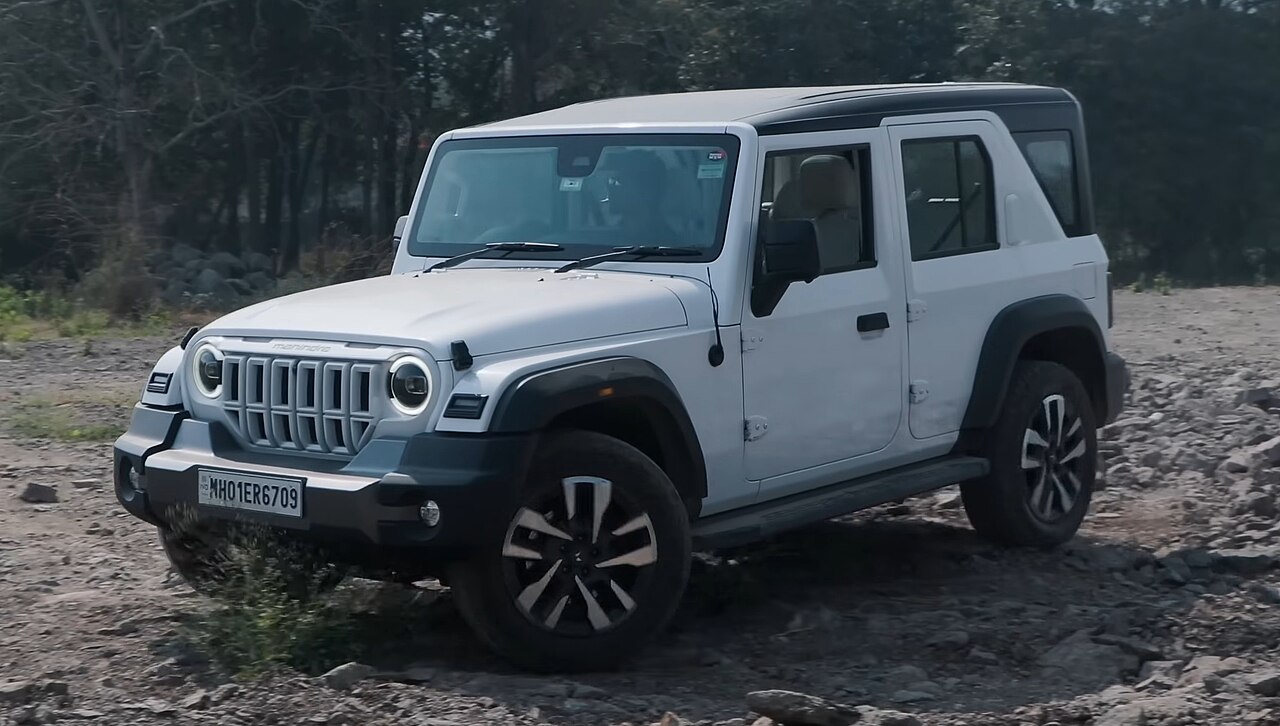 Mahindra Thar Roxx five-door SUV off-roading on rocks