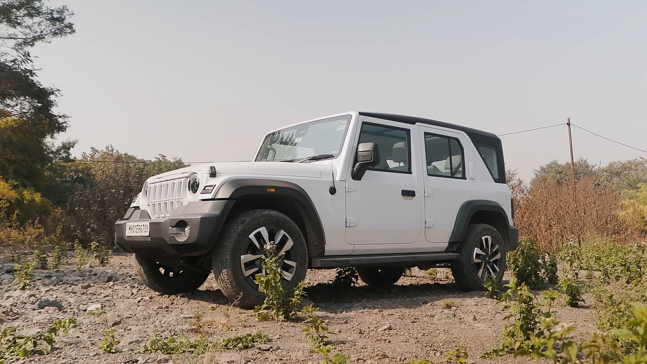 Mahindra Thar Roxx off-roading on a dirt trail