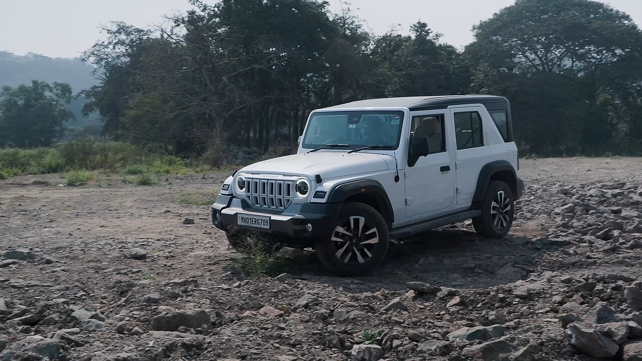 Mahindra Thar Roxx climbing rocky off-road terrain