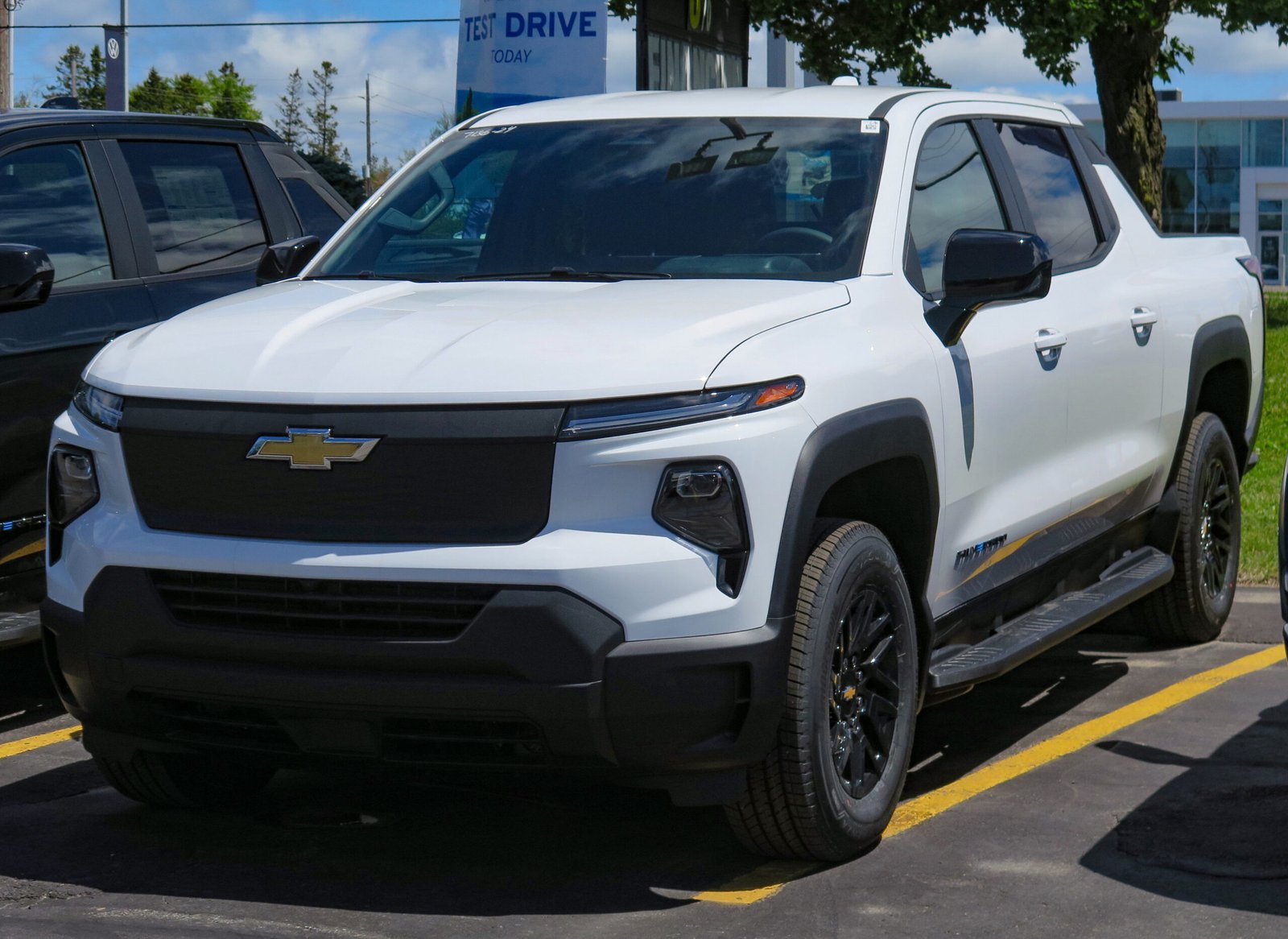Chevrolet Silverado EV pickup truck parked outside a dealership