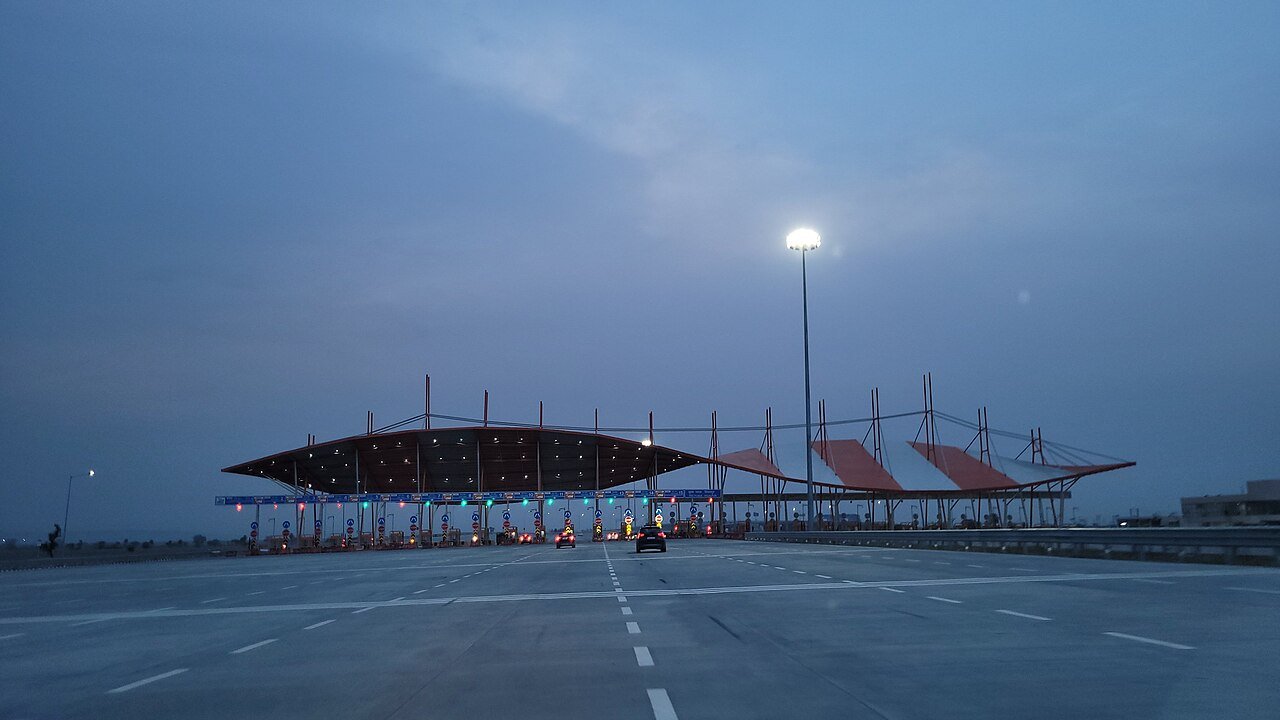 Toll plaza on the Delhi-Mumbai Expressway at dusk