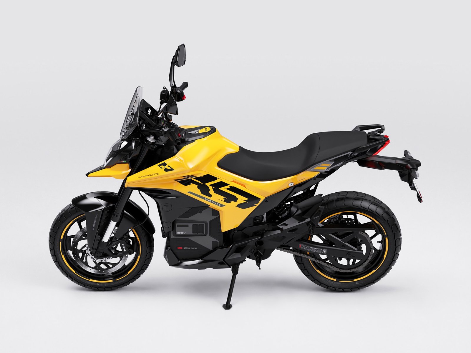 Ultraviolette X-47 Venom studio shot, front three-quarter view in yellow and black