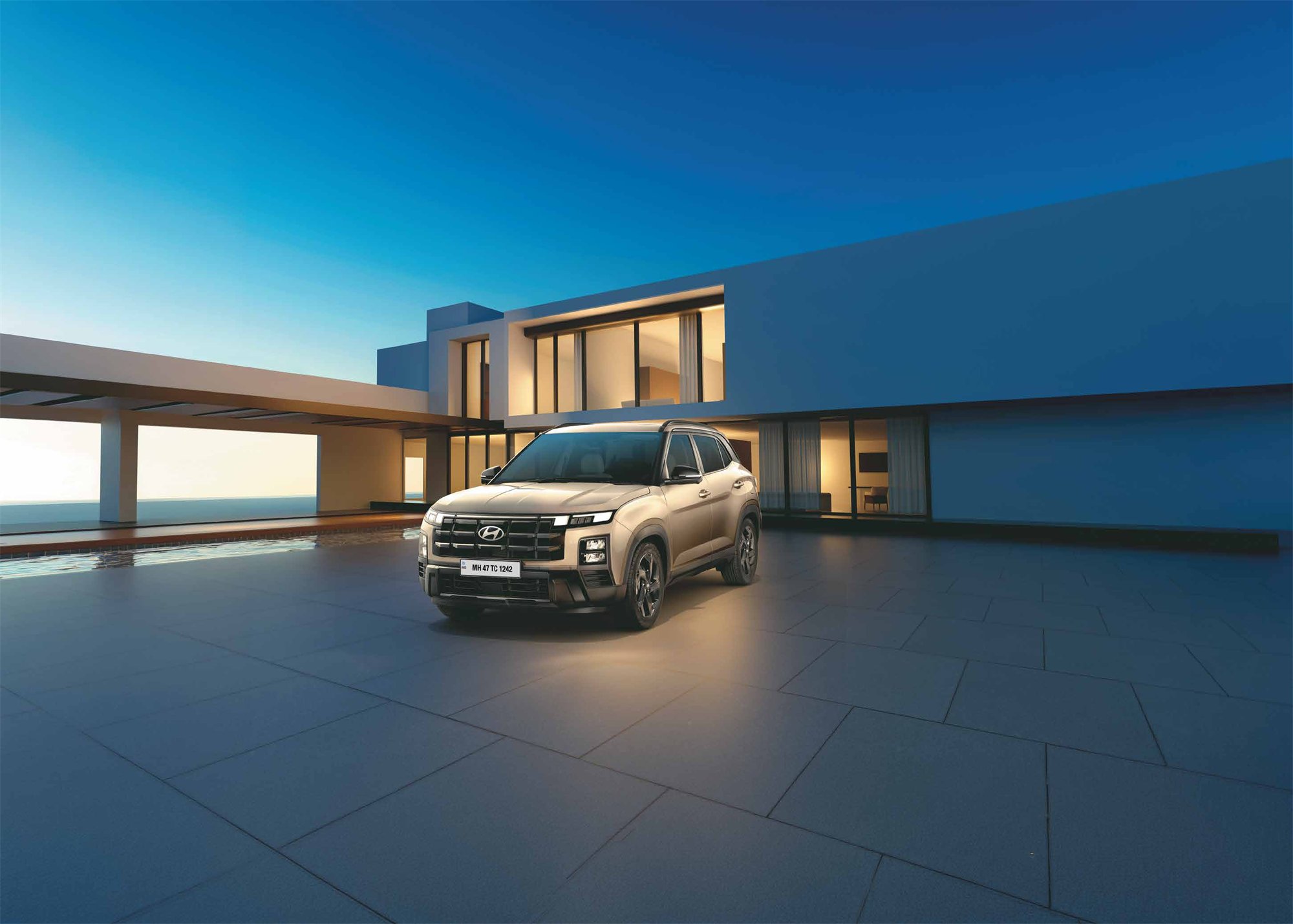 Hyundai Creta parked outside a modern villa at dusk