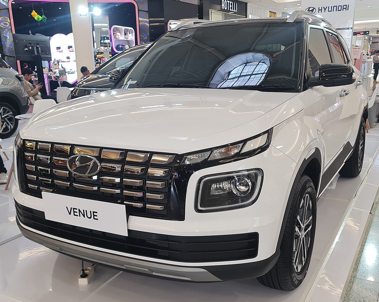 Facelifted Hyundai Venue on display at a showroom, front three-quarter view