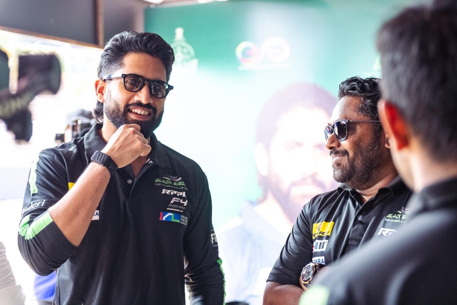 John Abraham with the Goa Aces JA Racing team and car at an Indian Racing League event