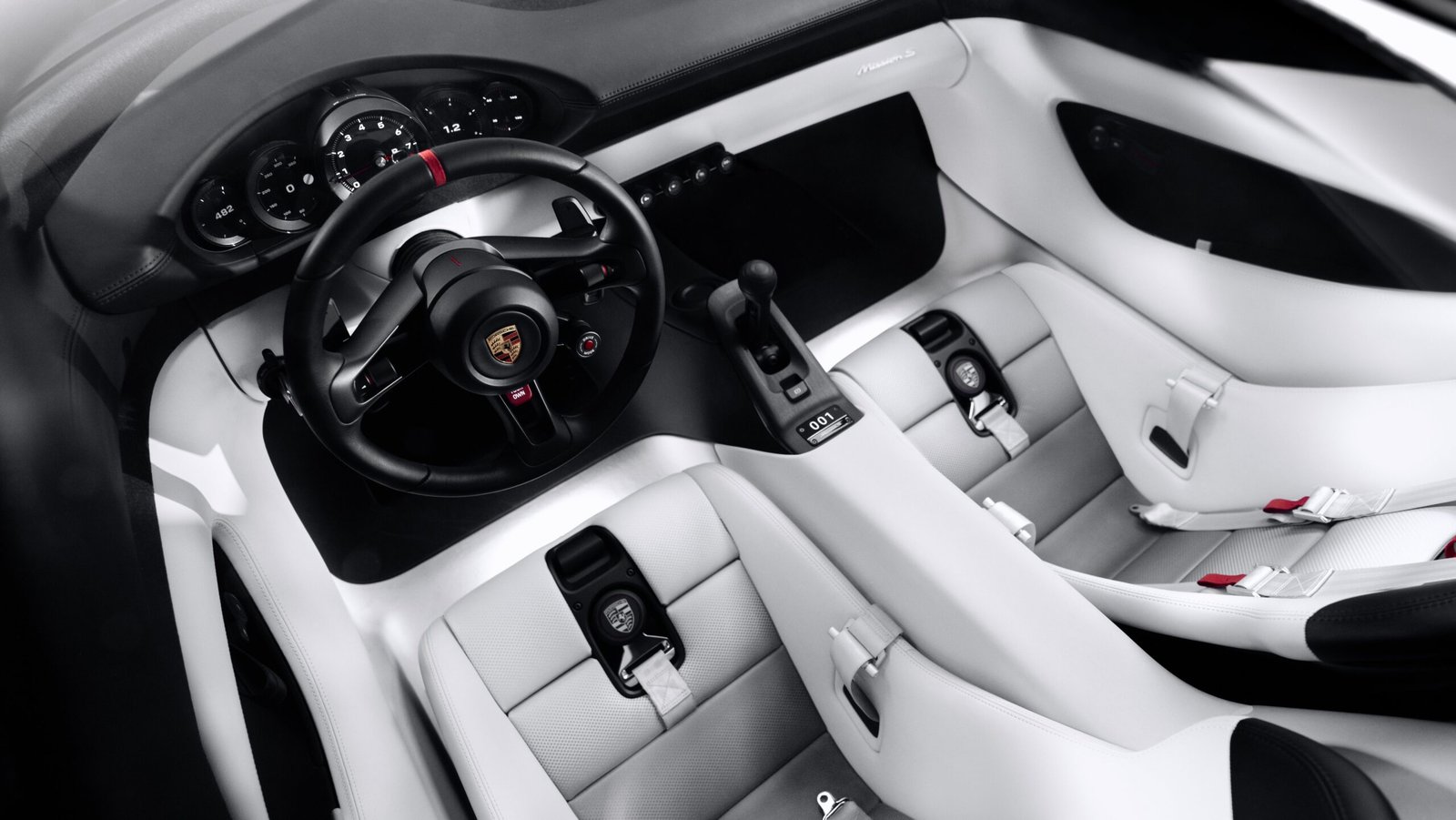 Porsche Mission S interior showing round analogue-style gauges and no fixed center touchscreen