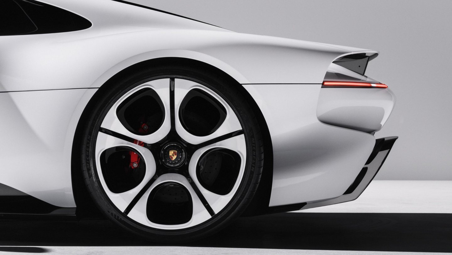 Rear three-quarter detail of the Porsche Mission S showing its slim tail lamp and reworked wheel design
