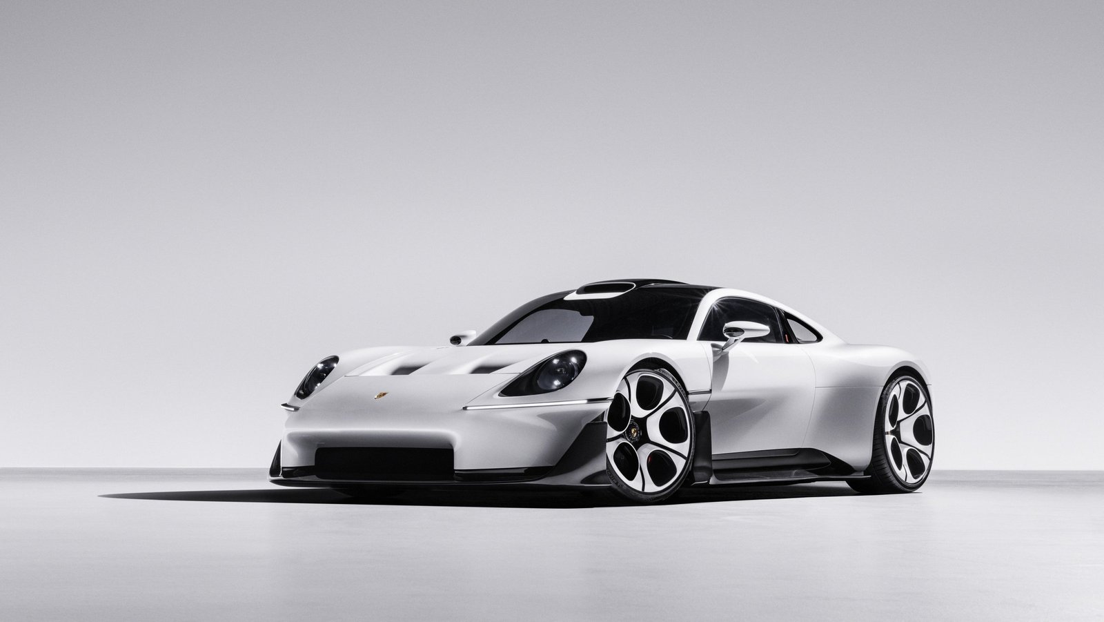 Porsche Mission S three-quarter studio shot showing its 911-inspired nose and 928-style wheels