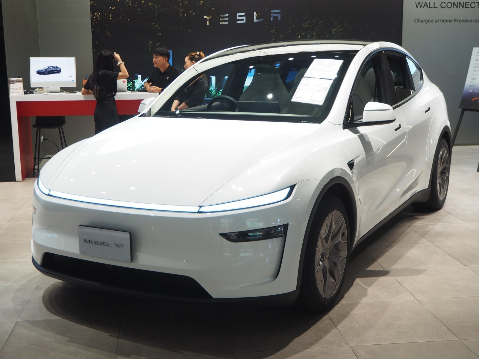 2026 Tesla Model Y L on display at a Tesla showroom